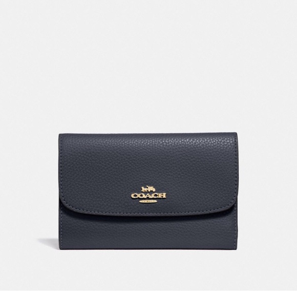 Coach Handbags - NWT COACH PEBBLE MEDIUM ENVELOPE WALLET